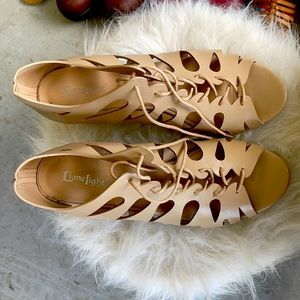 Lace up Wedges 2” high, like new.  Wear once.